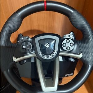 Black and Red Gaming Controller with Steering Wheel Design